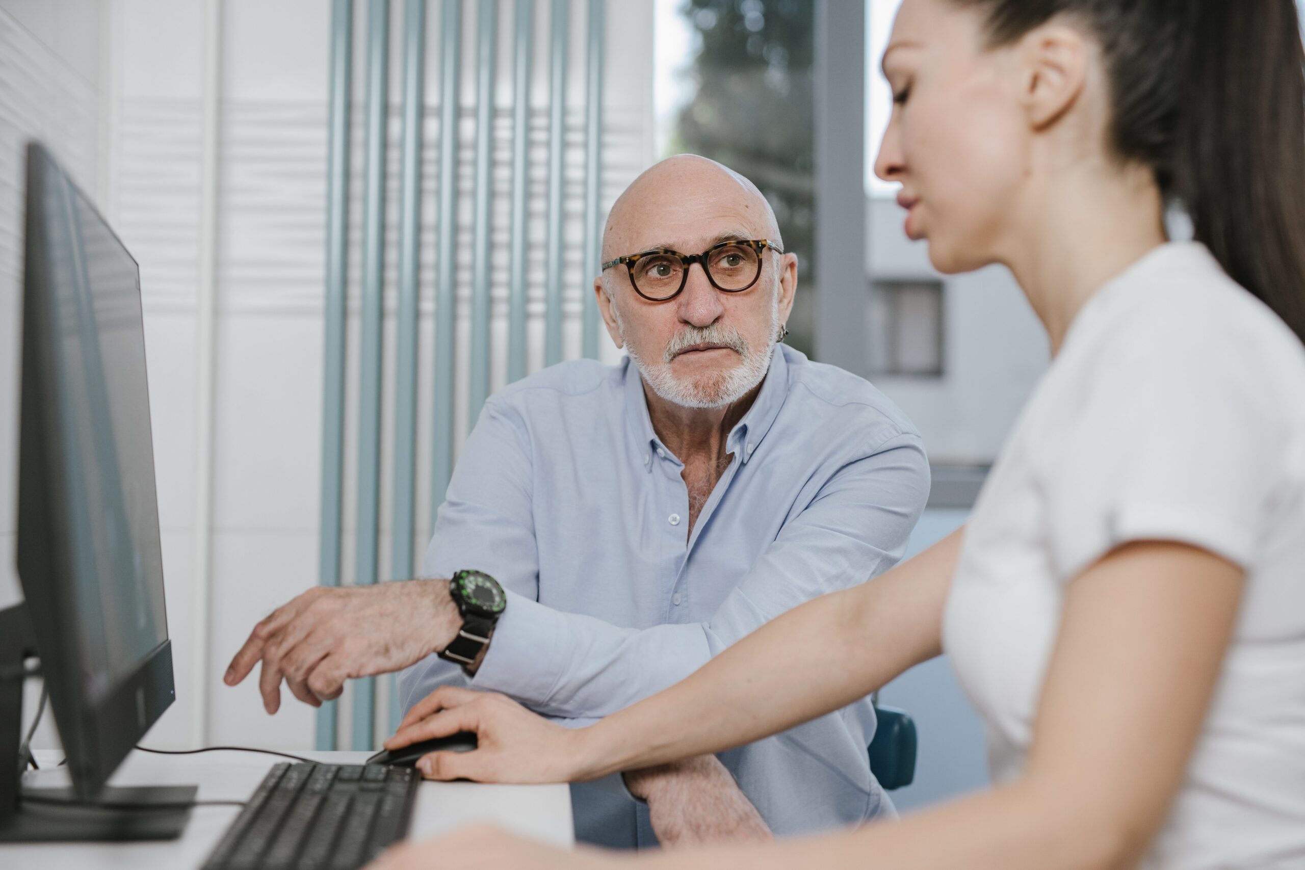 High Blood Sugar Symptoms: 7 Warning Signs After 55 older man discussing high blood sugar symptoms with his doctor