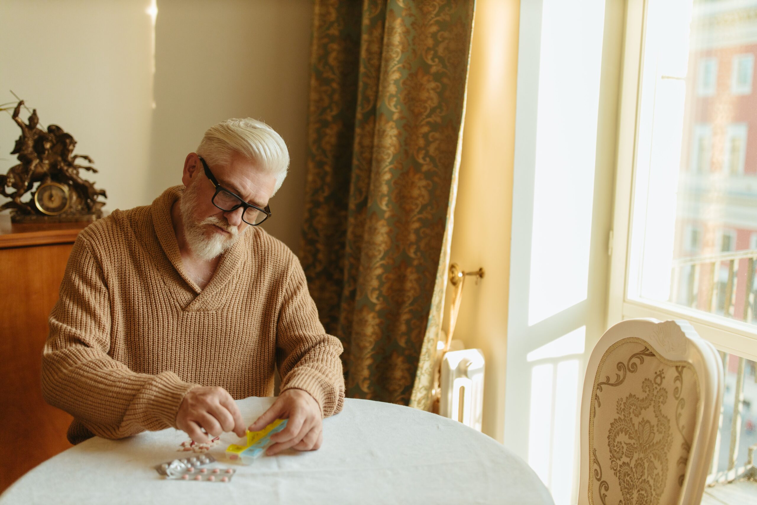 Why Does Blood Sugar Increase With Age? 6 Key Reasons After 55 older man with supplements — natural strategies to address why blood sugar increases with age