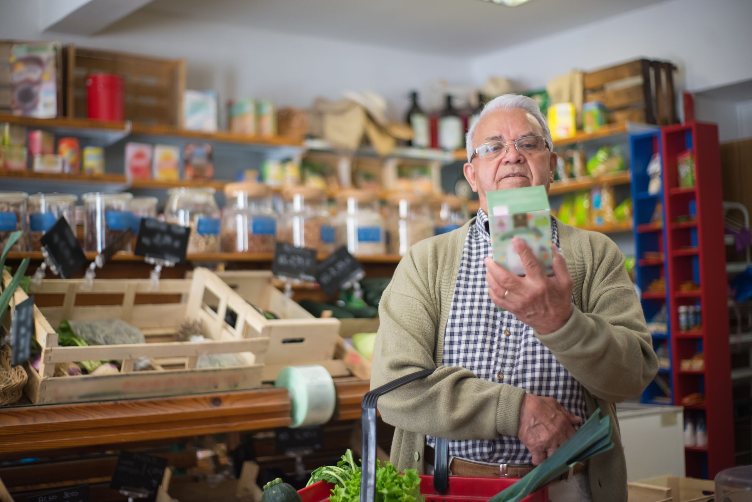 Lower Blood Sugar Supplements: What the Research Shows (2026) Older adult reading supplement label โ lower blood sugar supplements guide for adults over 55