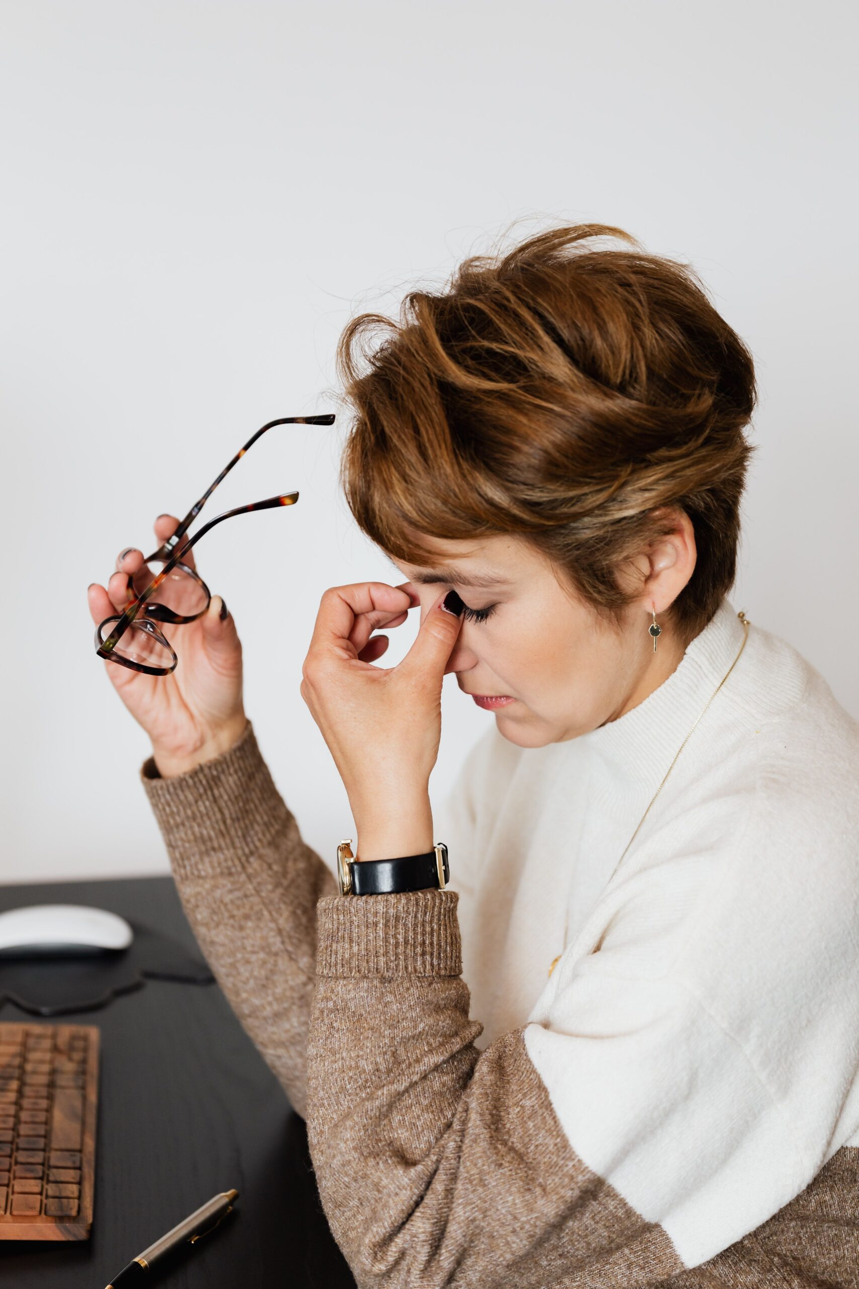 tired older woman experiencing fatigue from blood sugar issues